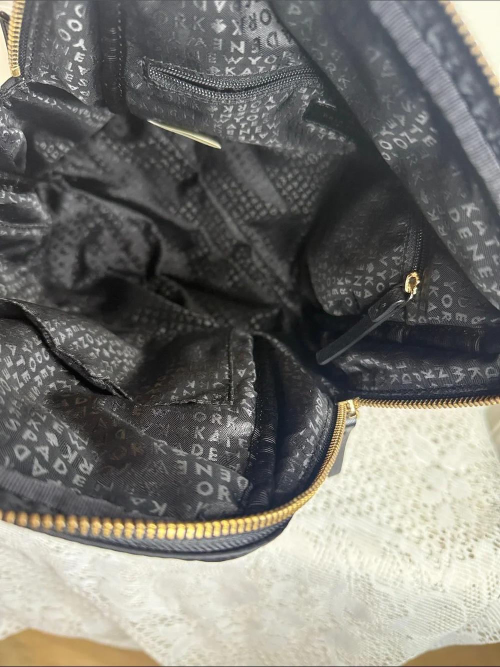 Kate Spade black nylon backpack with gold-tone hardware